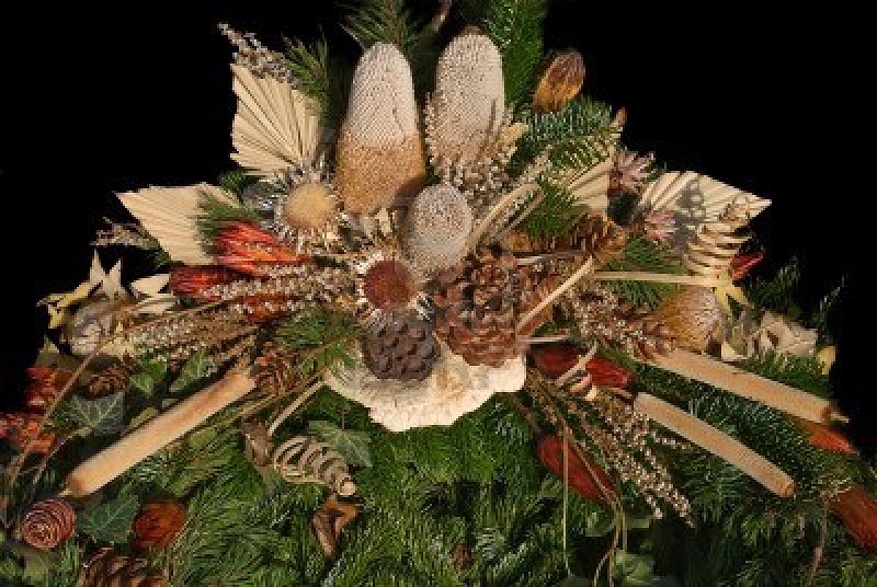 3853135-floral-arrangement-with-dried-flowers-and-pine-needles